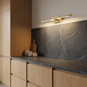 Aplica Tirso în auriu deasupra blatului, pe peretele